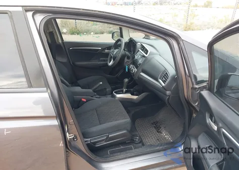 2015 Honda Fit Lx z USA, uszkodzony, nr VIN 3HGGK5H54FM784292